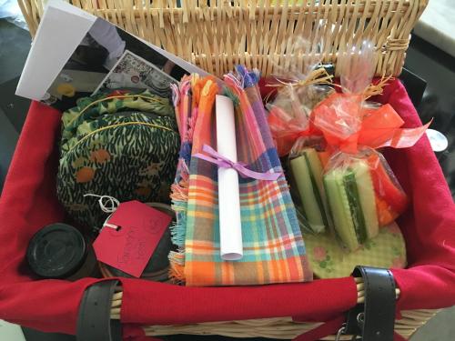 a basket filled with different types of food at Farmhouse B&B in Saint-Georges