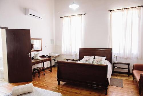 Postel nebo postele na pokoji v ubytování White House Guest Farm
