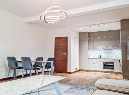 Kuchyň nebo kuchyňský kout v ubytování Apartament VIP CENTRUM