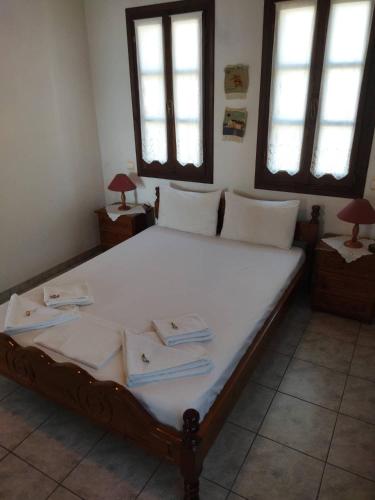 Una cama o camas en una habitación de Magda Studios - Vigla Studio