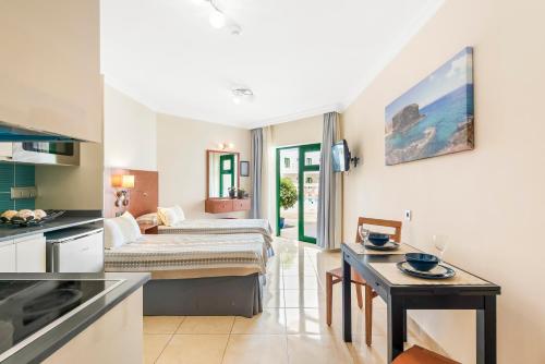 Postel nebo postele na pokoji v ubytování Las Adelfas