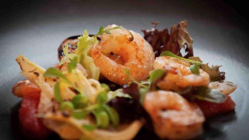 a plate of food with shrimp and other foods at Lady Gregory Hotel, Leisure Club & Beauty Rooms in Gort