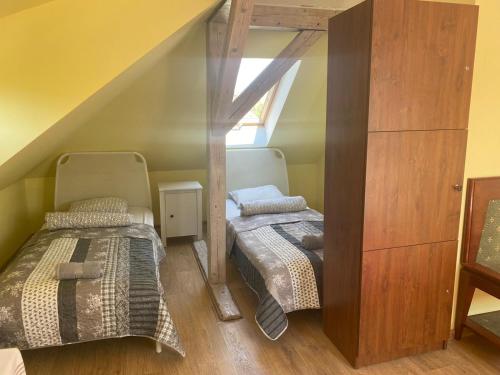 Cama o camas de una habitación en Muffin Hostel