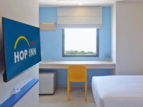 เตียงในห้องที่ HOP INN Nakhon Ratchasima City Center