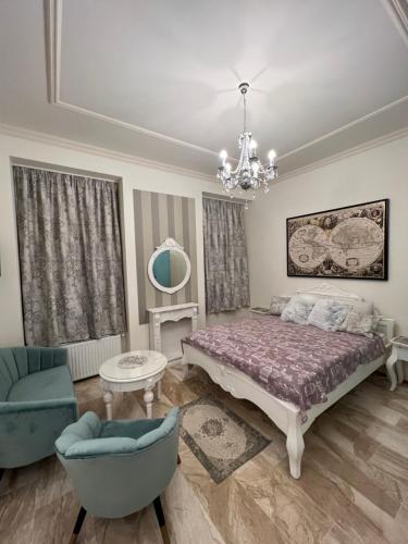 Posteľ alebo postele v izbe v ubytovaní Kalitka Apartman