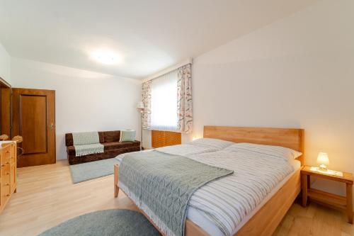 Posteľ alebo postele v izbe v ubytovaní Rosi's Wörthersee apartment
