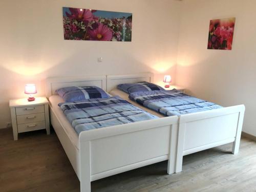 Postel nebo postele na pokoji v ubytování Nordic - Nordhorn