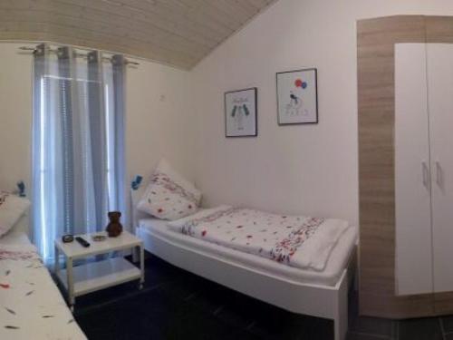 Säng eller sängar i ett rum på Haus Stressfrei - Nordhorn