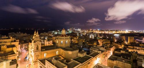 Nespecifikovaný výhled na destinaci Sliema nebo výhled na město při pohledu z hotelu