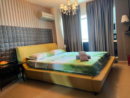 Katil atau katil-katil dalam bilik di PENTHOUSE GROUP 4 Apartments