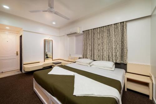 Postel nebo postele na pokoji v ubytování Hotel Balwas International