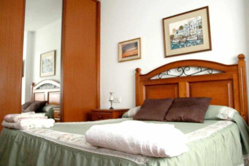 Cama o camas de una habitación en Alquiler Maruxela