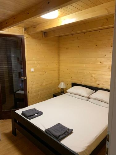 Säng eller sängar i ett rum på Boja zalaska 1