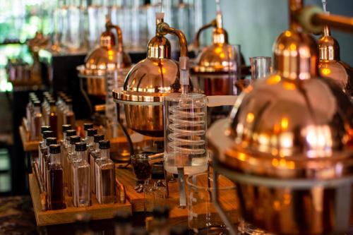 a group of bottles and glasses on a table at Indaba Hotel, Spa & Conference Center in Johannesburg