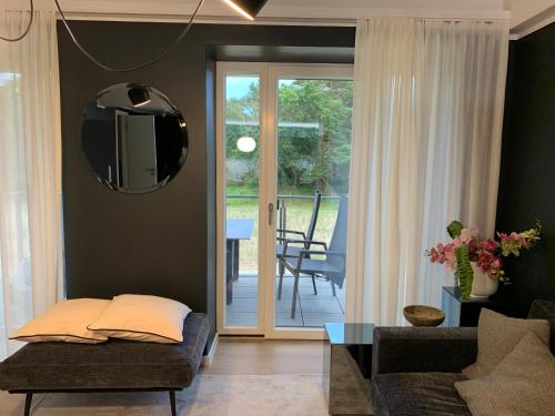 Posezení v ubytování FeWo Prora - Designapartment Sir Henry