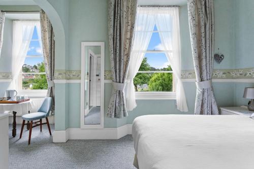 Ein Bett oder Betten in einem Zimmer der Unterkunft The Berburry