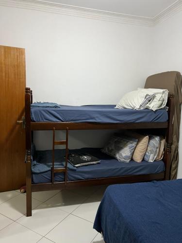 Apartamento p temporadasにあるベッド