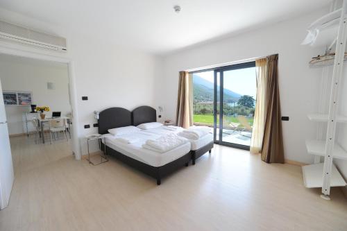 Ένα ή περισσότερα κρεβάτια σε δωμάτιο στο Residence Goethe