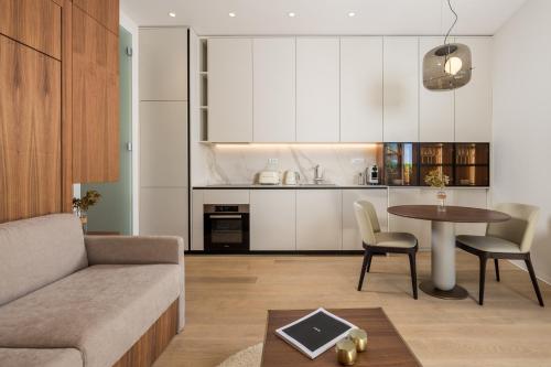 Η κουζίνα ή μικρή κουζίνα στο Plaza Apartments