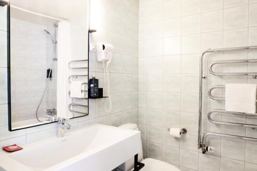Koupelna v ubytování Fosshotel Lind
