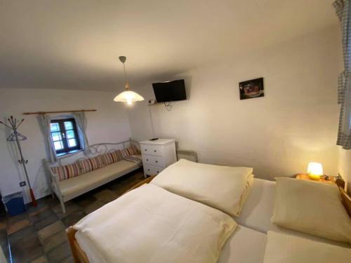 Tempat tidur dalam kamar di Apartments Mali Raj