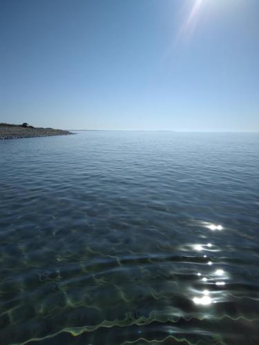 a view of a body of water at MERSINERA PARADISE GARDEN STARS HOUSE in Larnaka
