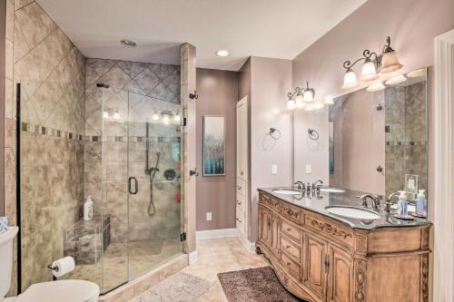 a bathroom with a shower and a sink at Waterfront Getaway with Fire Pit and Game Room! in Iva