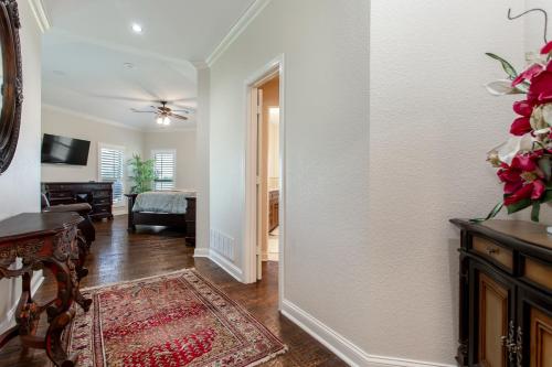 a hallway of a home with a living room at Newly Renovated Private Ranch Get-A-Way in Pilot Point