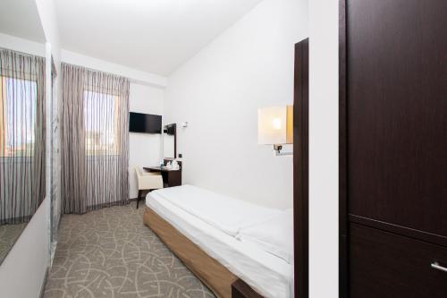 Katil atau katil-katil dalam bilik di Hotel Bonotto