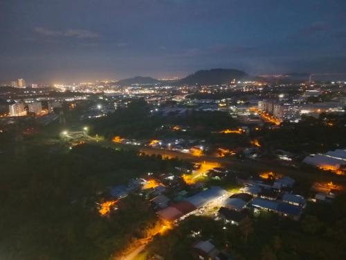 an aerial view of a city at night at Comfortable18 3R2B 7pax Meritus Perai in Perai