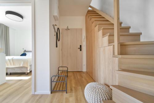 Posteľ alebo postele v izbe v ubytovaní Apartmán v stráni