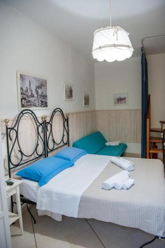 Ένα ή περισσότερα κρεβάτια σε δωμάτιο στο Vacanze al San Domenico