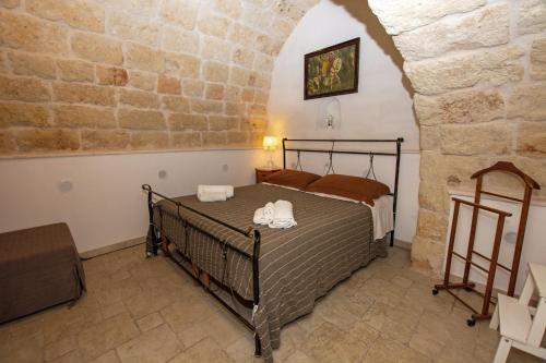 Ένα ή περισσότερα κρεβάτια σε δωμάτιο στο Vacanze al San Domenico