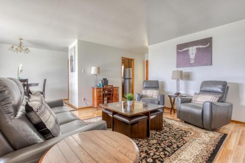 a living room with a couch and a table at Machouse in McMinnville