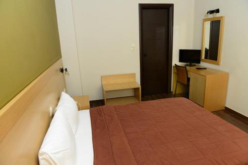 Katil atau katil-katil dalam bilik di Ionion Hotel