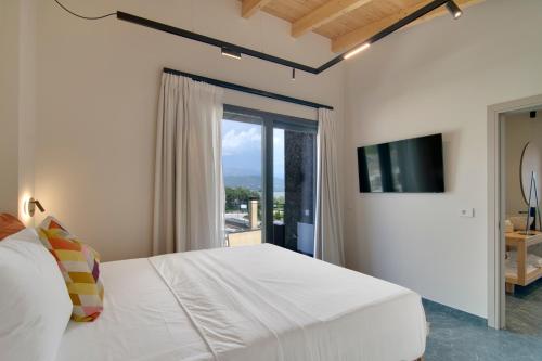 Posteľ alebo postele v izbe v ubytovaní Selin Luxury Residences