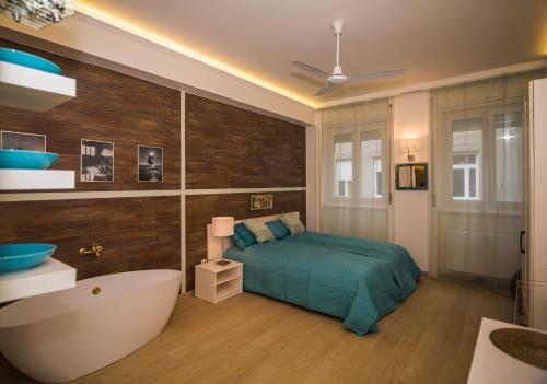 Posteľ alebo postele v izbe v ubytovaní Liszt Studio Holiday Home