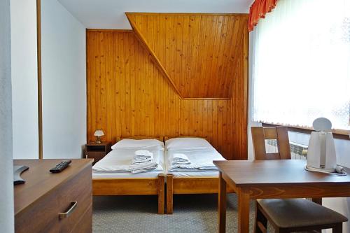 Postel nebo postele na pokoji v ubytování Wypoczynek u komperdow Jacuzzi&Basen ogrodowy