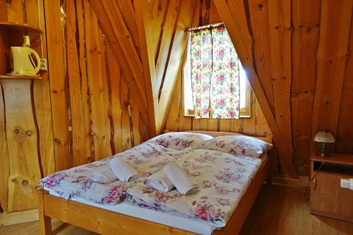 Postel nebo postele na pokoji v ubytování Wypoczynek u komperdow Jacuzzi&Basen ogrodowy