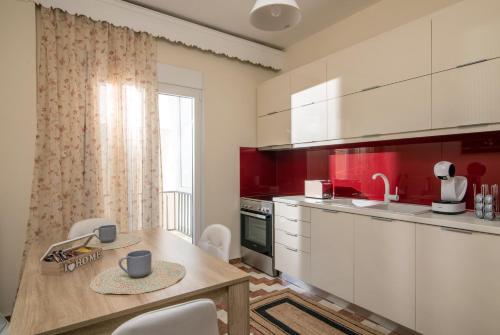 Kuchyň nebo kuchyňský kout v ubytování City Life Apartment