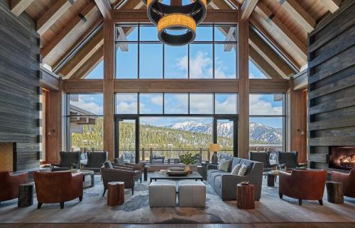 a large living room with a large window at Montage Big Sky in Big Sky