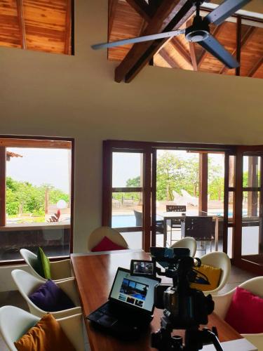 a camera sitting on a table in a living room at Palmetto Lodge in Playa San Miguel 