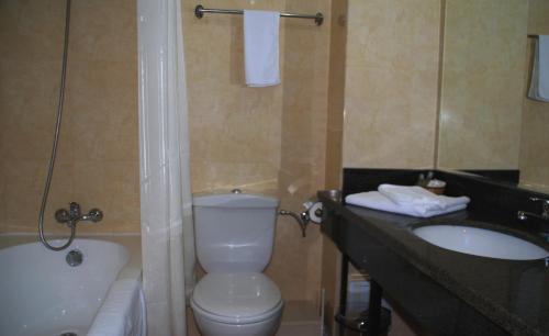 Koupelna v ubytování Hotel Ancor