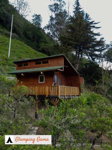 a house on the side of a hill at Glamping la Kumbre - Gama in Gama