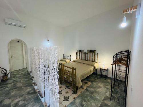 a bedroom with two beds in a room at Calliope Ponza Immobilevante in Ponza