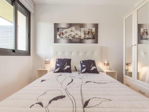 Posteľ alebo postele v izbe v ubytovaní Belvilla by OYO Modern Apartment in Palamos