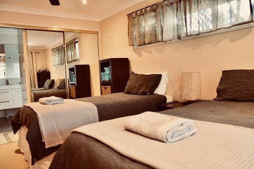 Postel nebo postele na pokoji v ubytování TL Warmest Homestay