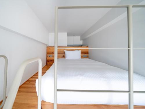 Postel nebo postele na pokoji v ubytování Hotel Locus