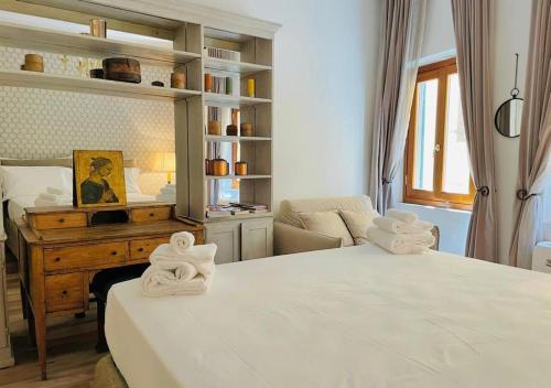 Posteľ alebo postele v izbe v ubytovaní Santa Maria Novella apt