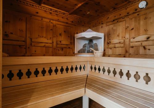an inside view of a sauna with wood paneling at HOFERHOF Schladming -Dachstein in Schladming